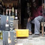 Champagne bottles displayed at a roadside shop in Lagos. (AFP)