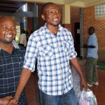 Prominent Zambian gay rights activist Paul Kasonkomona leaves the Lusaka magistrate court on April 11 2013, where he pleaded not guilty to charges of promoting homosexuality, after appearing live on television to argue for his cause. The 38-year-old activist was arrested in the capital on April 7, minutes after he appeared on a live TV show where he openly advocated for gay rights. (AFP)