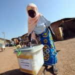 A woman casts her ballot at the Bole polling station, in the Bole Bamboi constituency of northern Ghana on December 7 2012. (AFP)