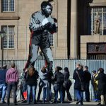 The six metre-high 'Shadow Boxer' sculpture in Johannesburg's inner city depicts Nelson Mandela as a young boxer. (AFP)