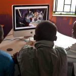 Scholars watch the film Madagascar in the computer lab at Mwelu Foundation in Mathare slum, Nairobi, Kenya. (Pic: Supplied)