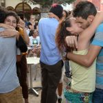 Participants take part in a "kiss-in" outside the Parliament in the Moroccan capital Rabat on October 12 2013. (Pic: AFP)