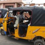 A cabbie driver dressed in sleeveless T-shirt and cutoff pants - clothing considered 'indecent' by Nigeria's Islamist cops. (Pic: AP)