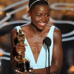 Lupita Nyong'o accepts her best supporting actress Oscar for her role in '12 Years A Slave'. (Pic: AFP)