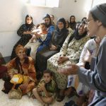 Sister Joanna, head of the Coptic Centre for Training and Development, an NGO based in Beni Sueif, a town 130km south of Cairo, participates in a lecture on Female Genital Mutilation (FGM) attended by Christian and Muslim women in a nearby village. (Pic: AFP)