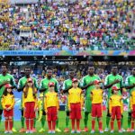 The Nigerian team sing their national anthem before taking on Iran in a Group F match on June 16. (Pic: AFP)