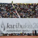 Rwandans gather under a banner at the Amahoro stadium in Kigali on April 7 2014, during a ceremony marking the 20th anniversary of Rwanda's genocide. (Pic: AFP)
