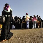 Ethiopian immigrants returning from Saudi Arabia arrive at Addis Ababa's Bole International Airport on December 10 2013. Each year, thousands of Ethiopians facing harsh economic realities at home seek work in the Middle East, but many face abuse, low pay and discrimination. (Pic: AFP)