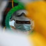 A medical worker checks his protective clothing at an MSF facility in Kailahun, Sierra Leone. (Pic: AFP)