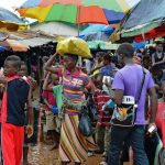Locals in a market in Kenema, Sierra Leone. (Pic: AFP)