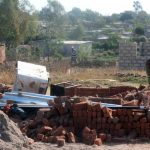 A Chitungwiza resident at what used to be her home. (Pic: Kumbirai Mafunda)
