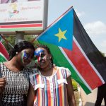 Women with their faces painted with the South Sudanese flag pose during celebrations marking three years of independence in Juba on July 9,2014.