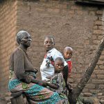 Safety: Mtongori Chacha (left) and her wife, Gati Buraya, with their children. The women say their union saves them from abuse by men. (Pic: AFP)