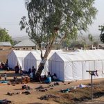People displaced as a result of Boko Haram attacks in the northeast region of Nigeria, are seen near their tents at a faith-based camp for internally displaced people in Yola, Adamawa State. (Pic: Reuters)