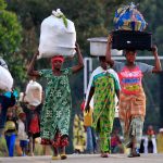 People displaced by fighting between the Congolese army and M23 rebels in Bunagana in the eastern Democratic Republic of Congo, make their way home. (Pic: Reuters)