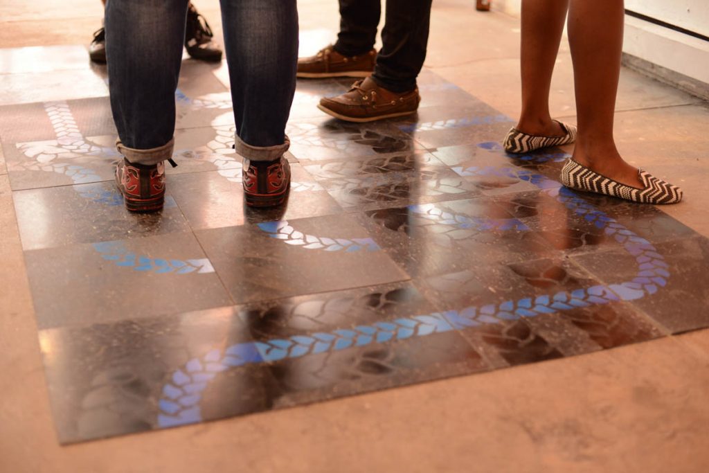 This piece - black and blue spray paint on black linoleum floor tiles - is part of an on going visual research project involving pattern and repetition of the braiding motif. (Pic: Monika Uchiyama)